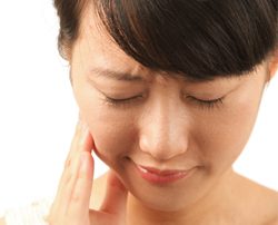 Woman with Sensitive Teeth